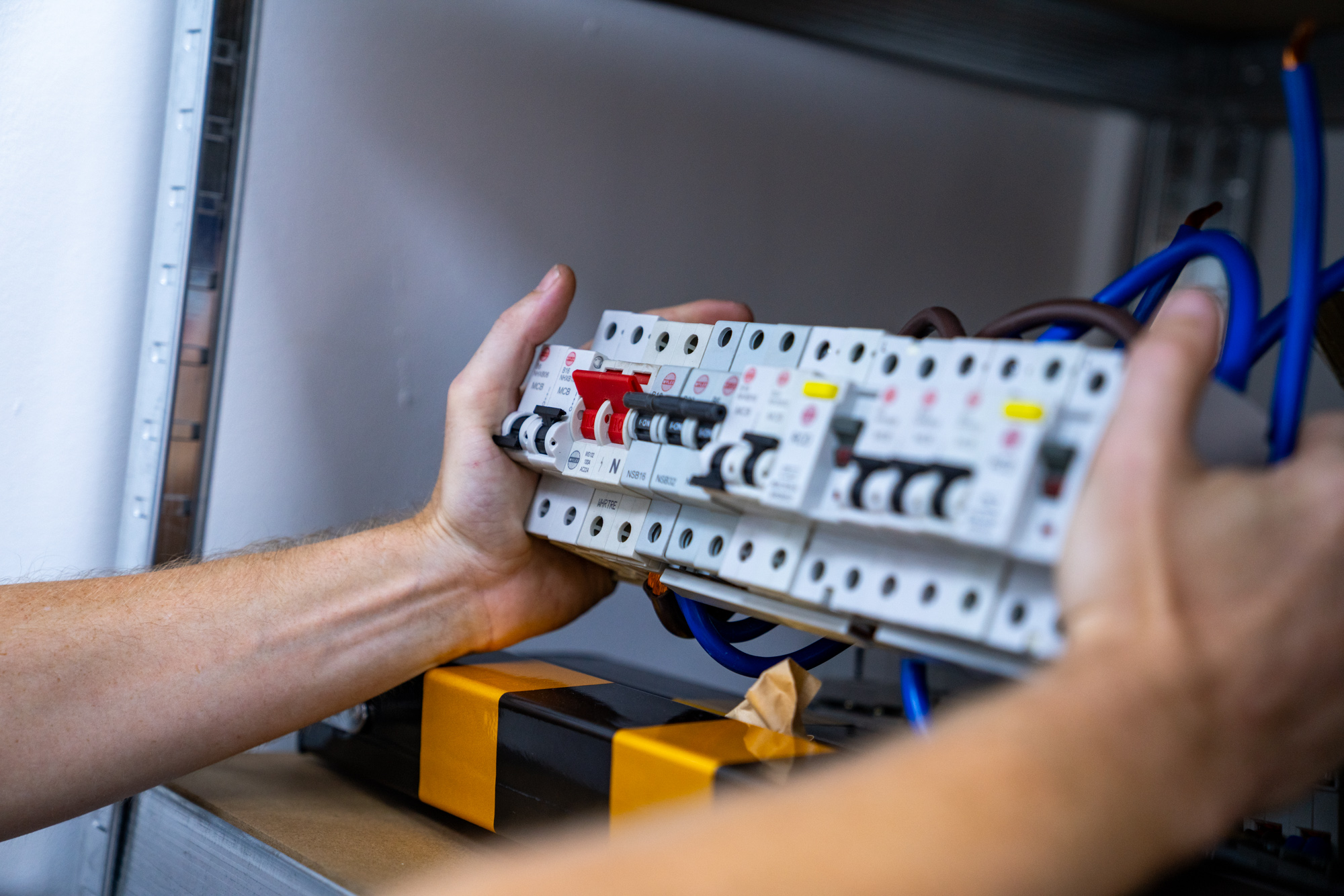 engineer holds a fuse board