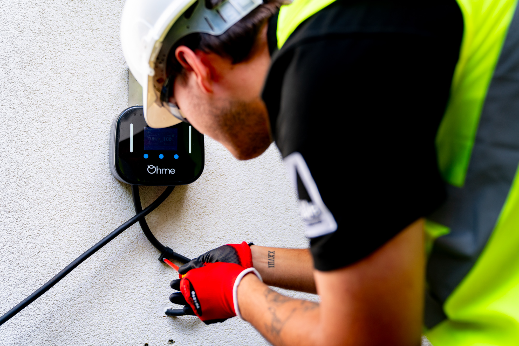 engineer installing an ev charger