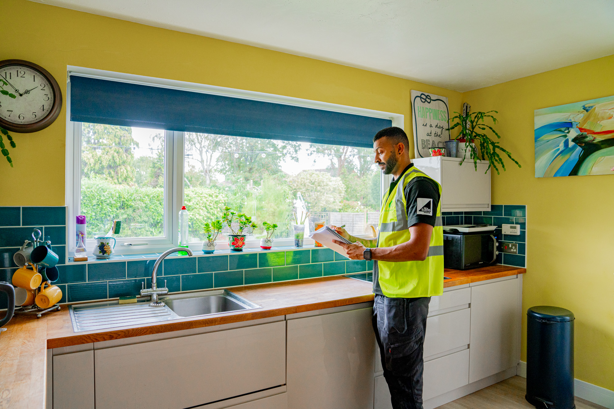EPC assessor in home carrying out an EPC assessment