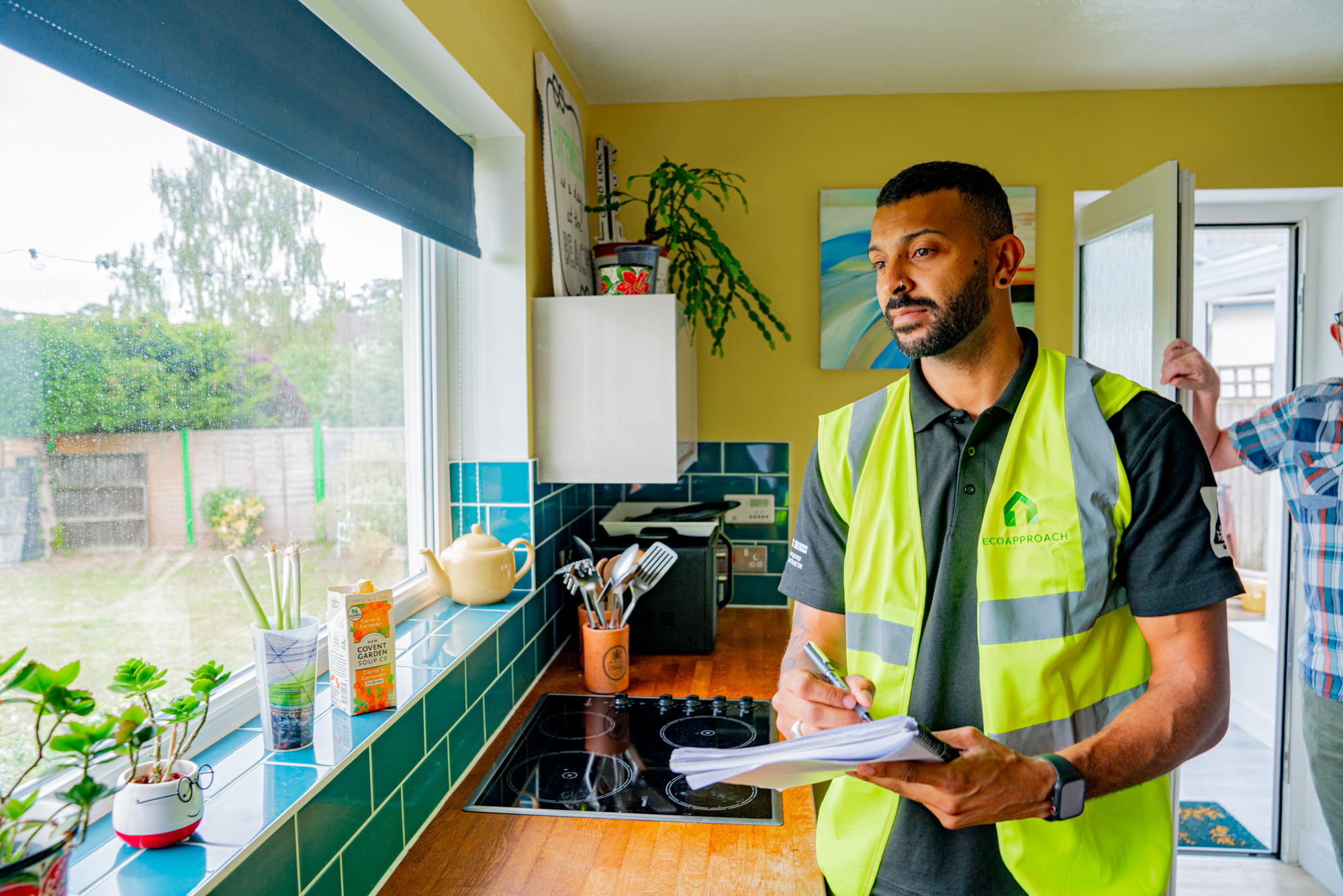 epc assessor conducting an epc assessment in a residential home