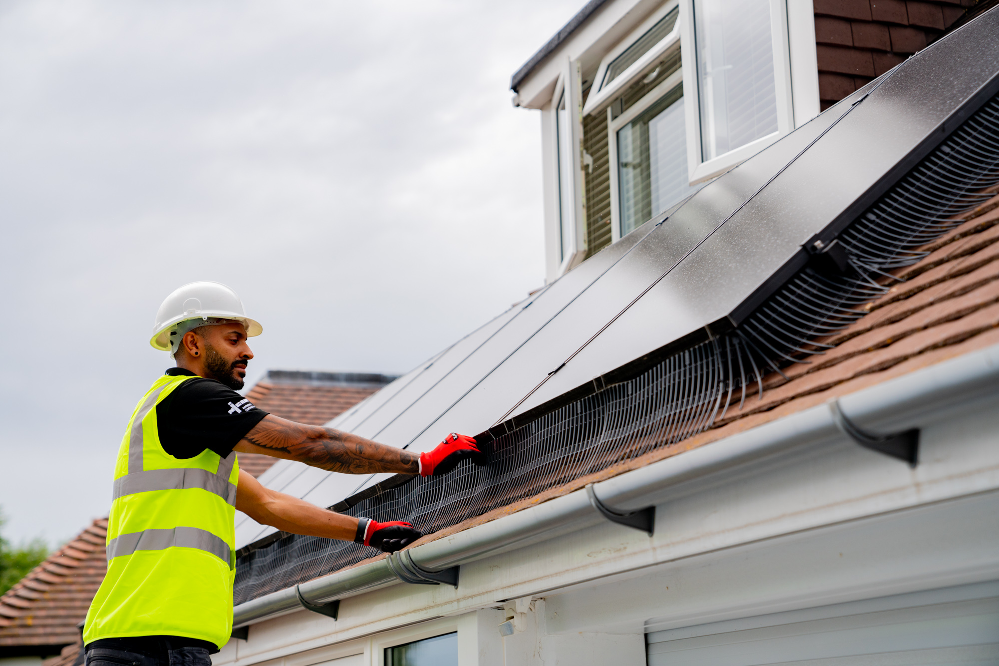 engineer installing solar panels