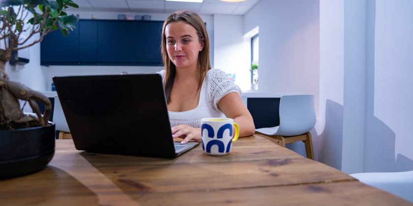 Landlord on laptop reading mees report