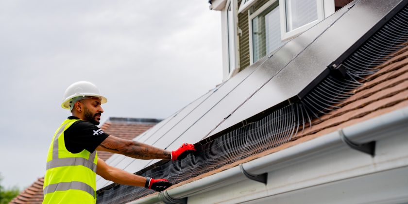 engineer installing solar panels